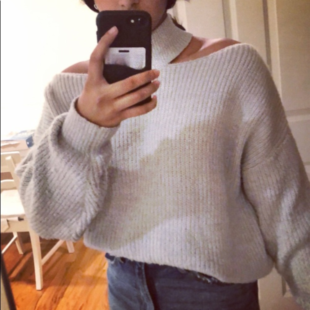 turtleneck sweater with cutouts